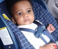 infant on a car seat