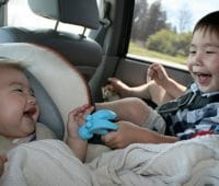 babies in car seats playing