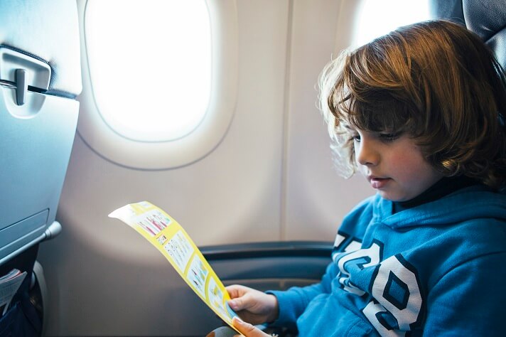 child-reads-the-safety-airplane