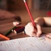 Young girl studying on a desk