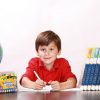 Young learner surrounded with books