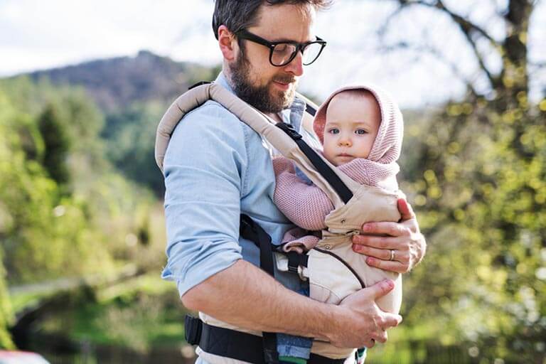 dad with baby carrier