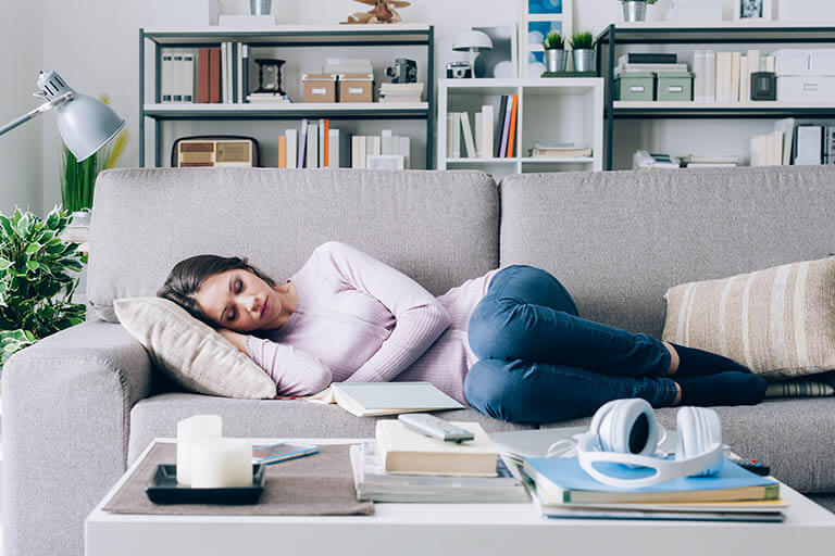 girl-sleeping-on-the-sofa